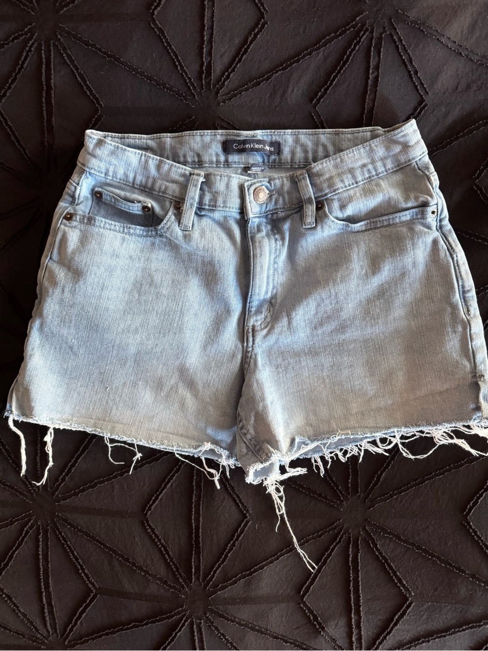 Calvin Klein Light Blue Denim Cutoff Shorts with Frayed Hem